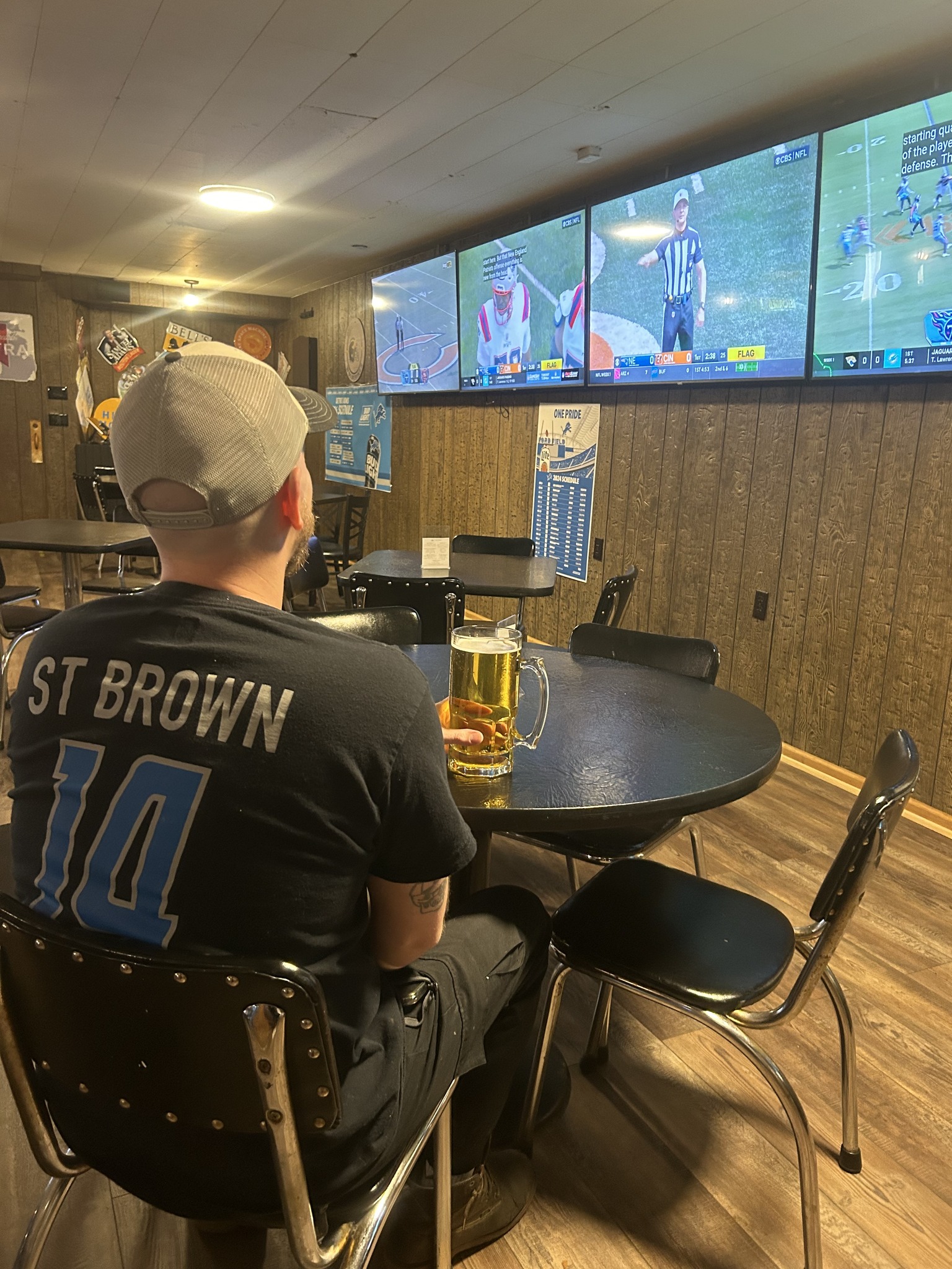 Saranac interior, TVs showing Lions game